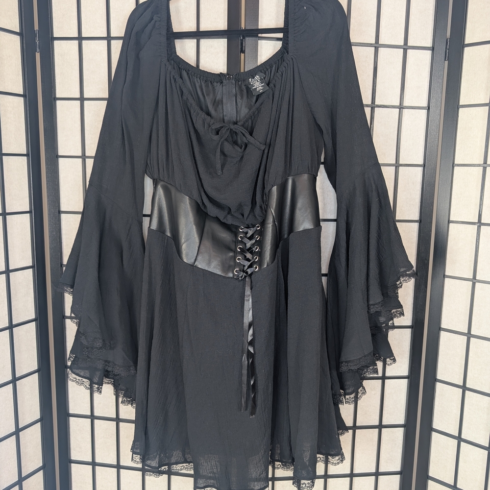 Elegant Black Mini Dress with Lace-Up Detail